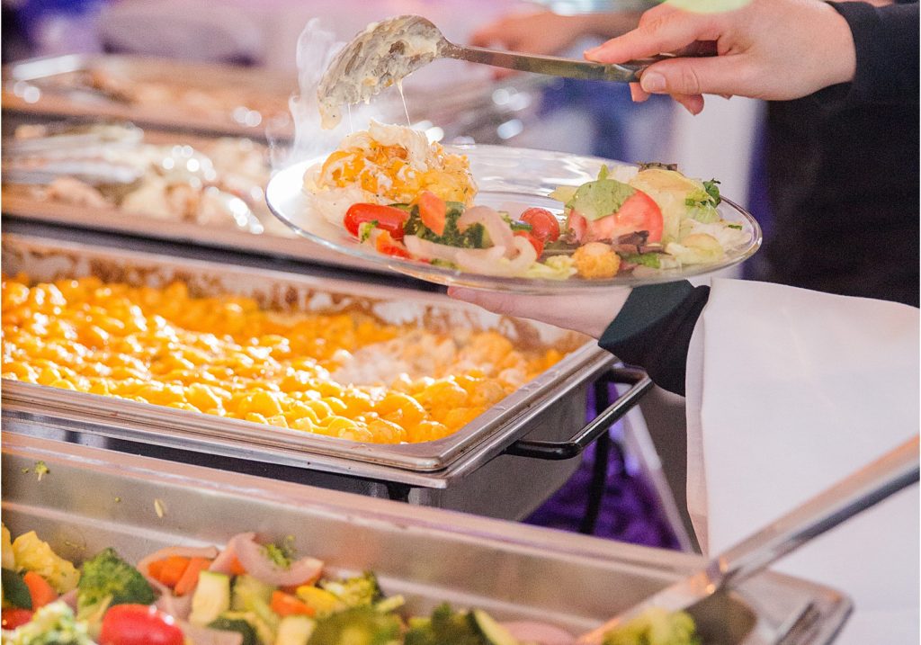 boulevard catering - katie jaynes photography. mac and cheese being dipped out next to salad