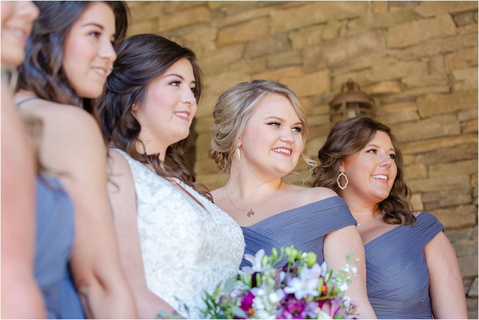 Bride and friends pose for wedding pictures
