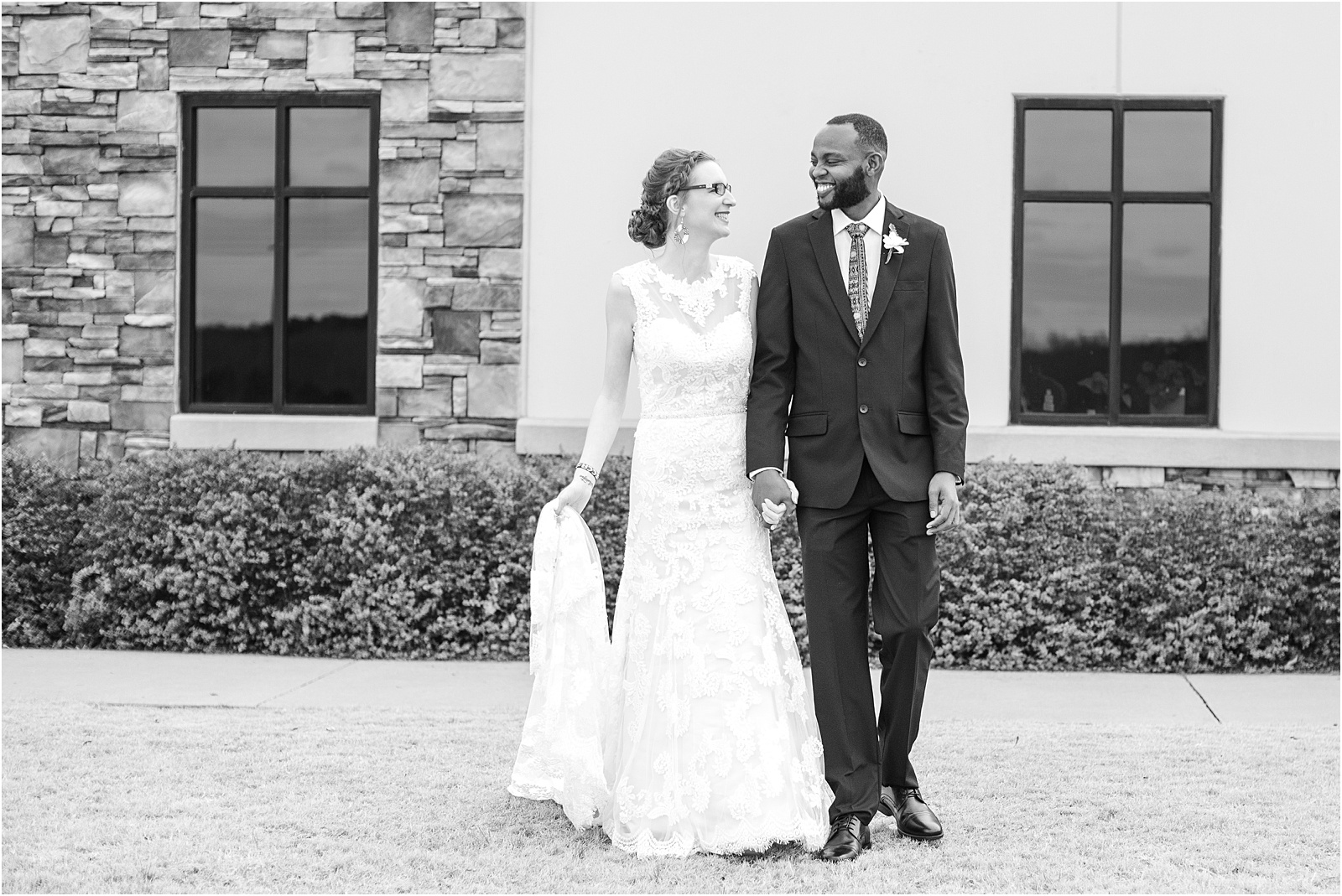 African husband walking with bride at Central SC wedding