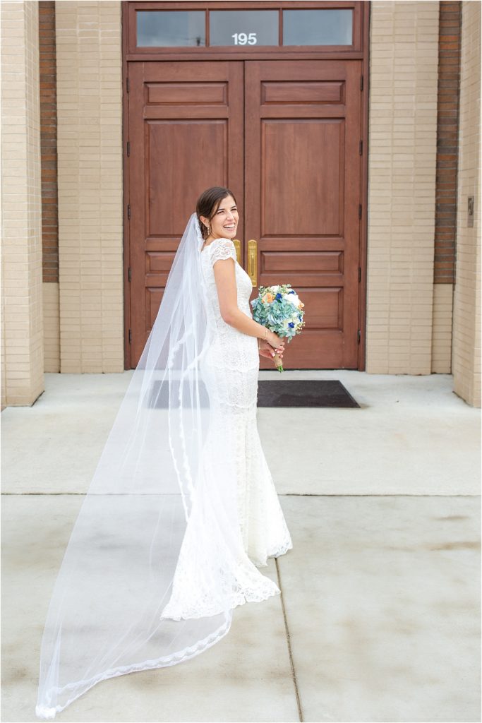 Bride walks into Catholic church for wedding