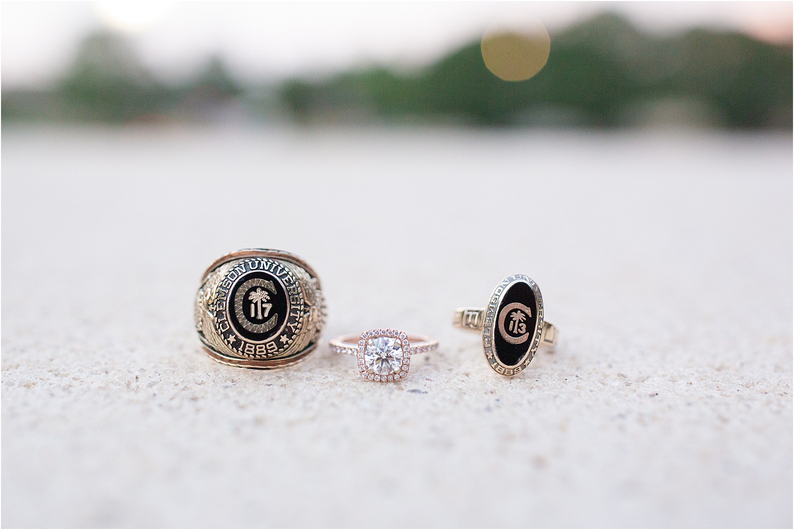 Wedding rings with Clemson graduation rings