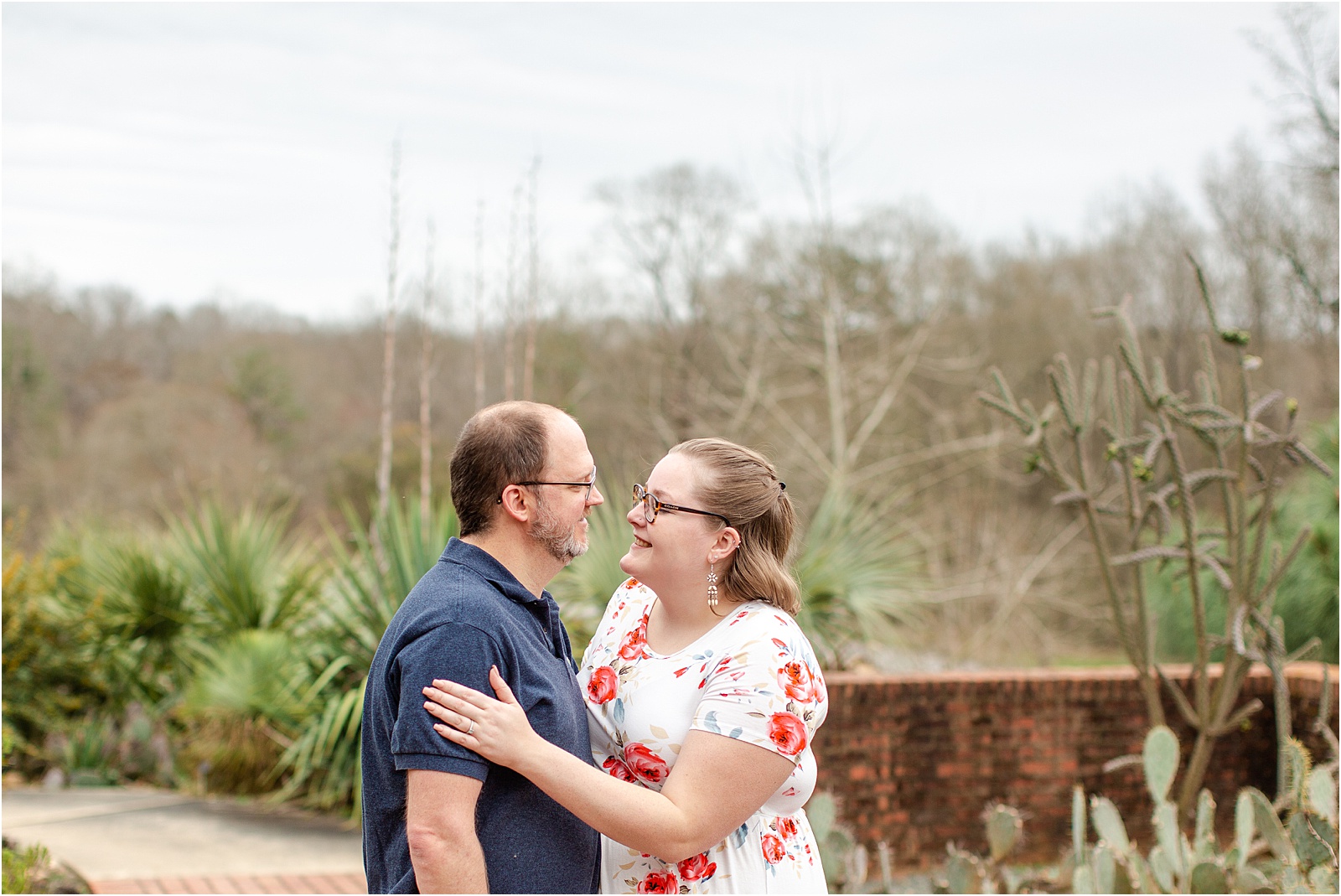 Couple poses with each other for engagement session