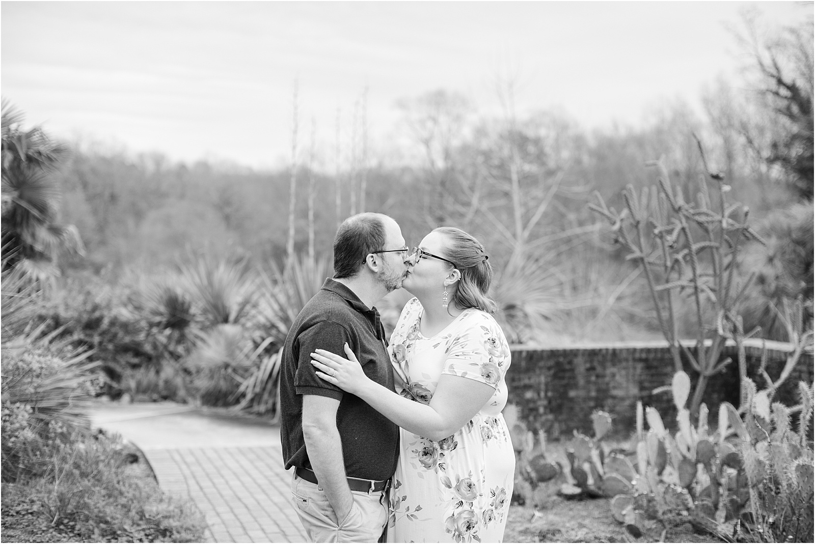 Couple kissing in Clemson garden