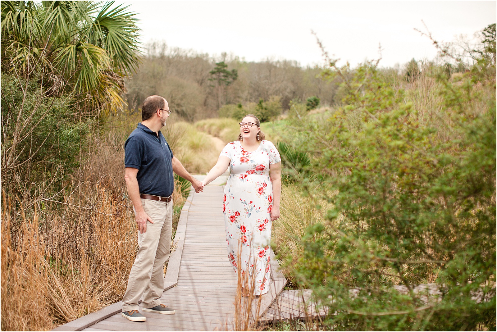 couple walking in garden for engagement session