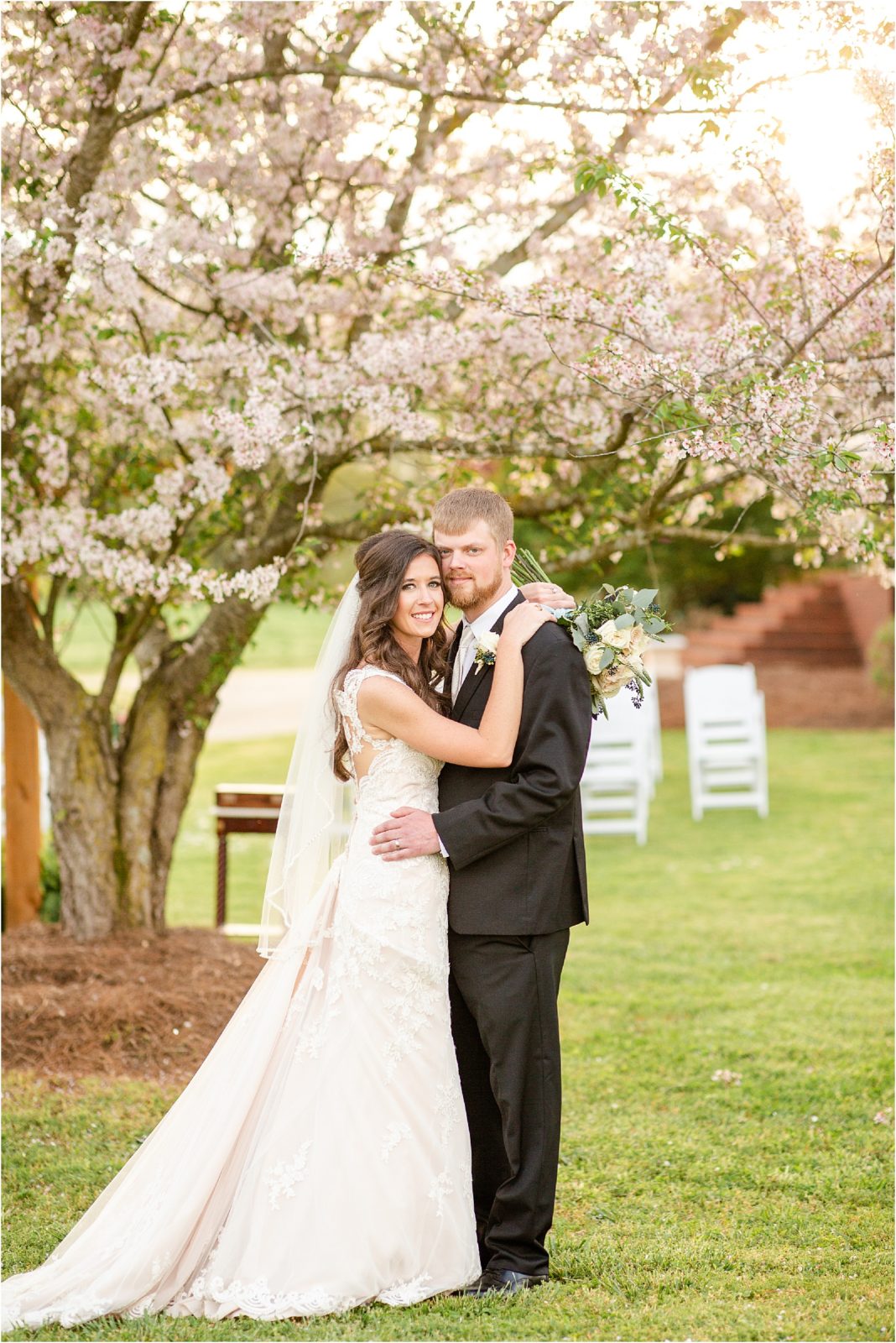Newlyweds posing for portraits in hartwell GA