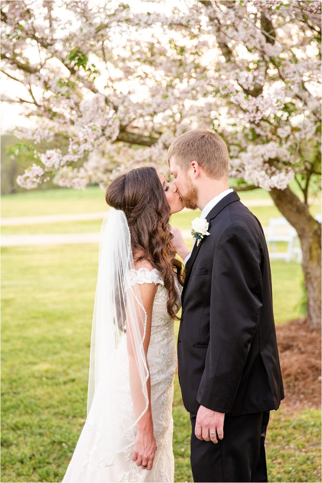 Wedding couple kissing after ceremony