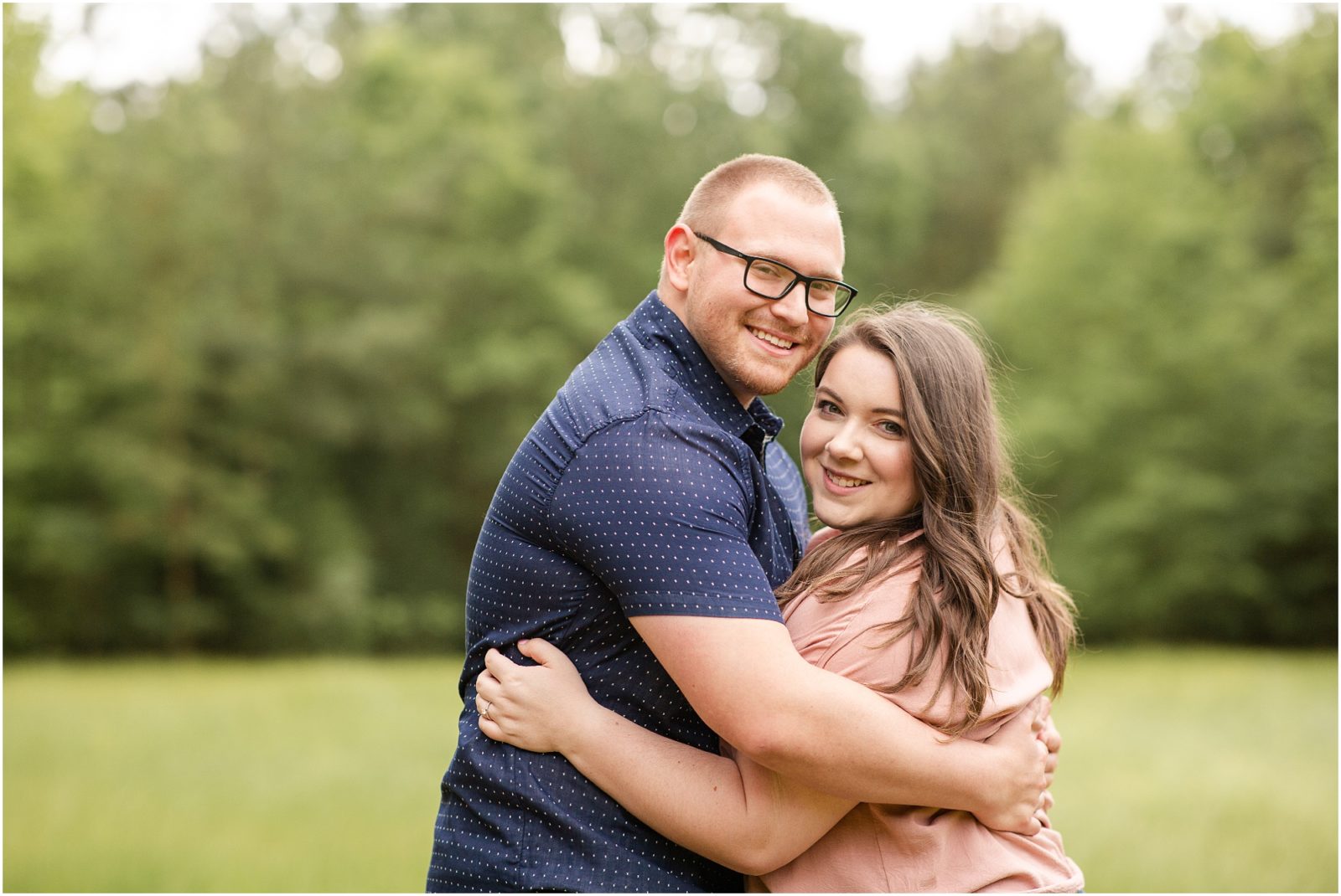 couple hugging for engagement photographer