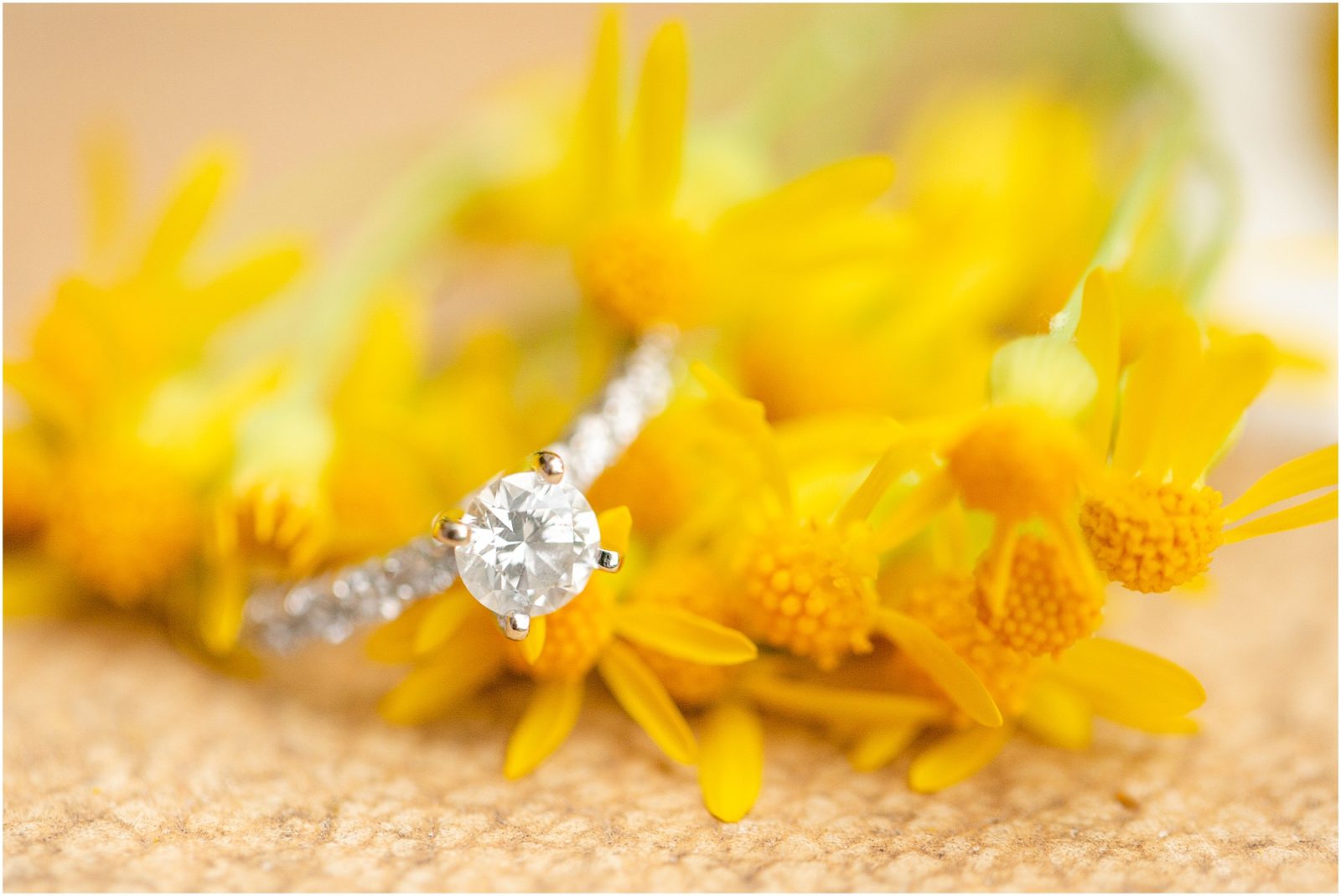 Diamond engagement ring with yellow flowers