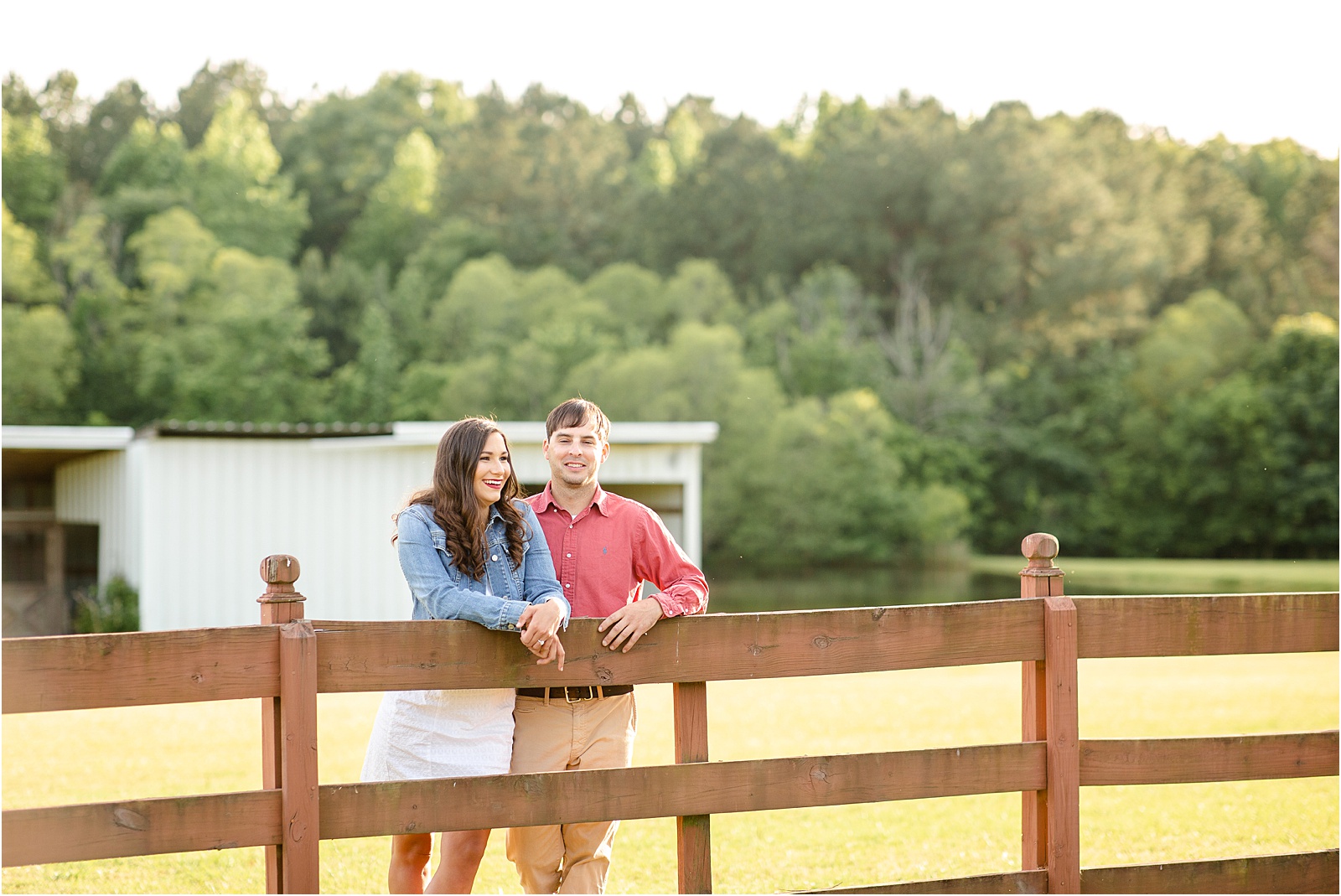 Engaged couple at rustic barn