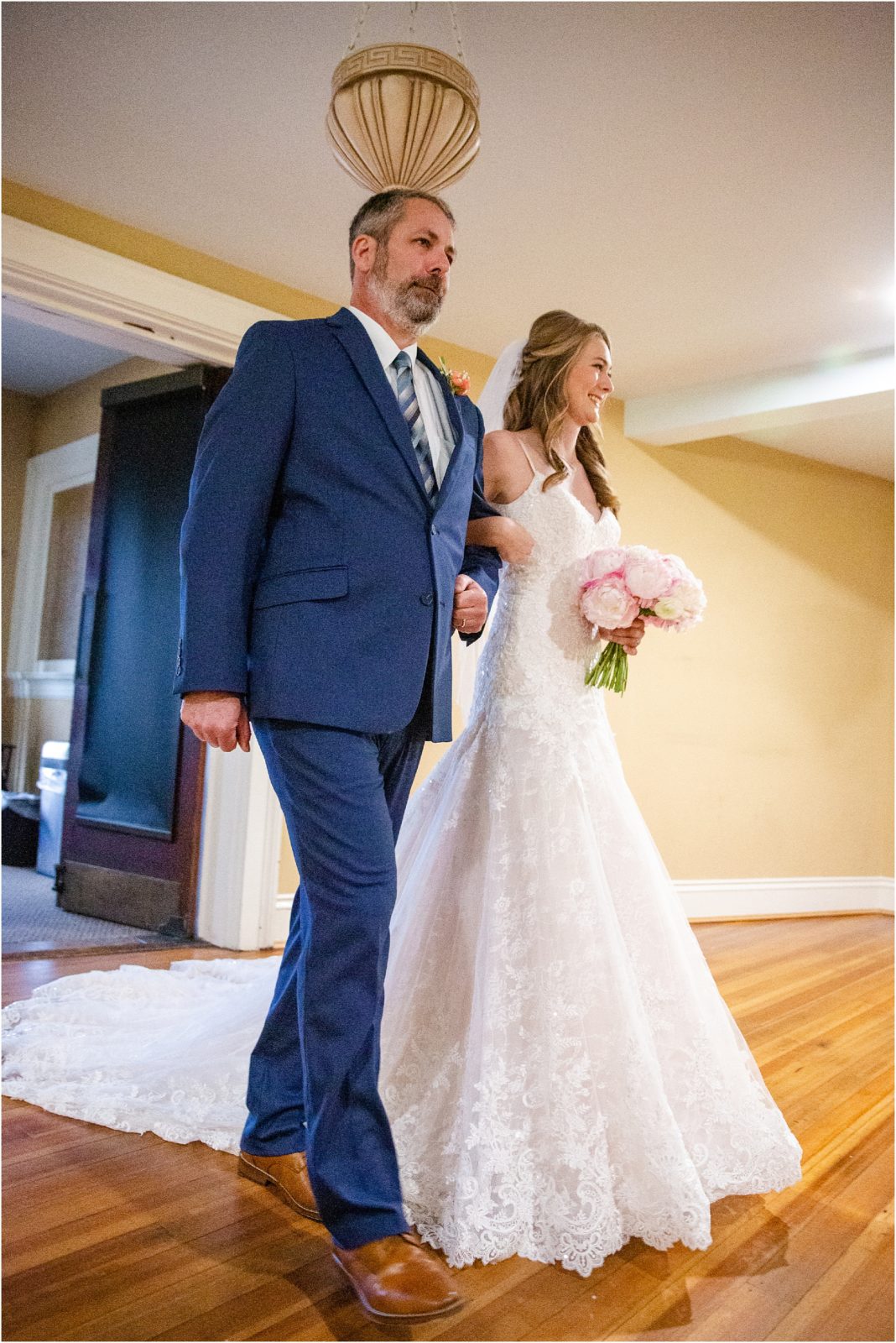 dad walks bride down church aisle