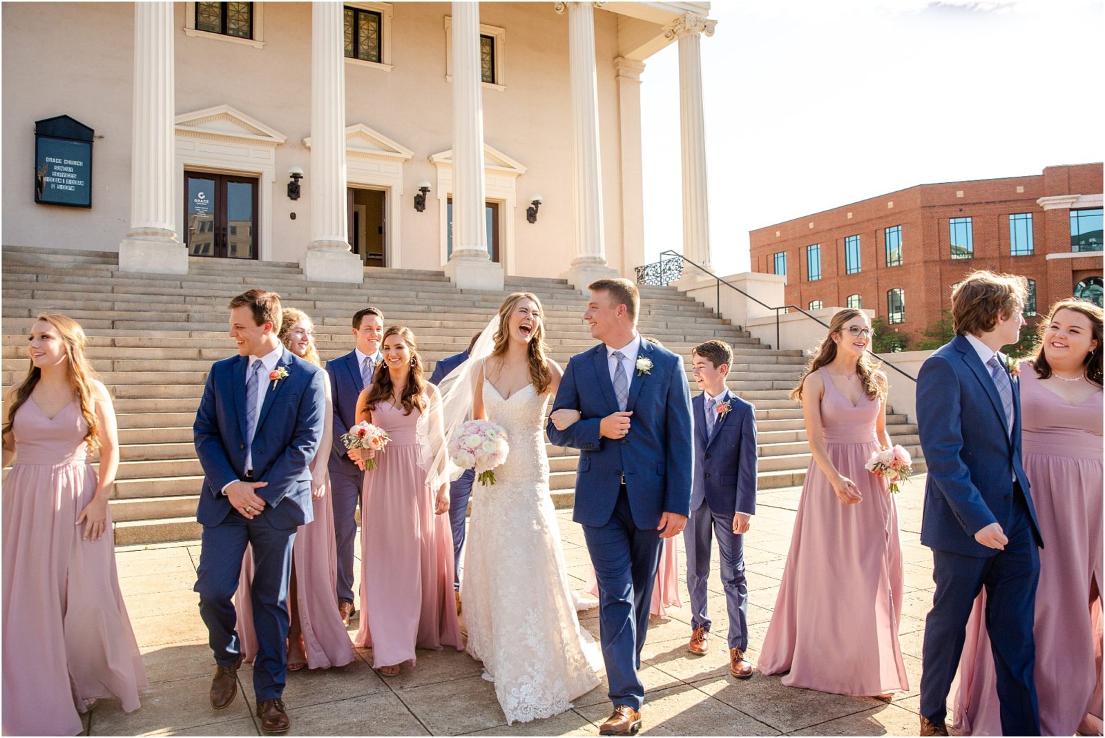 Full bridal party walking in downtown Greenville