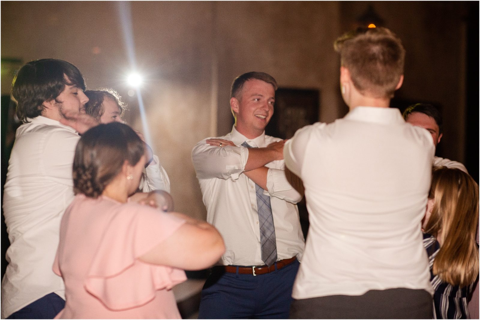 Guys dancing at wedding
