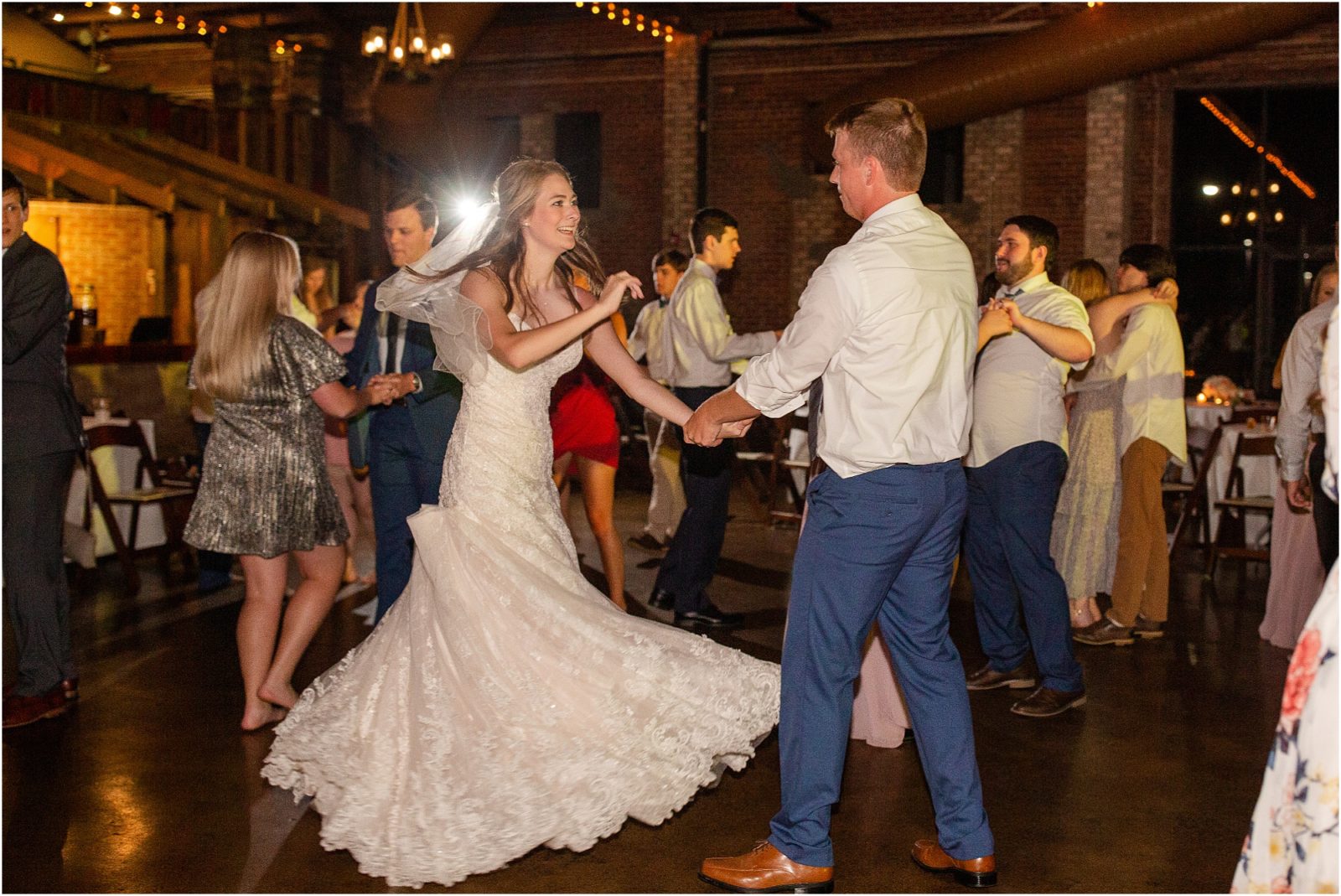 bride dancing with groom at Revel in Greenville