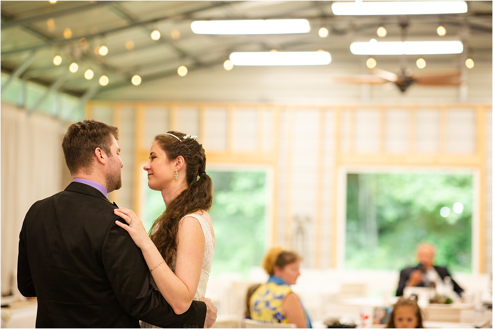Couple's first dance in a barn venue