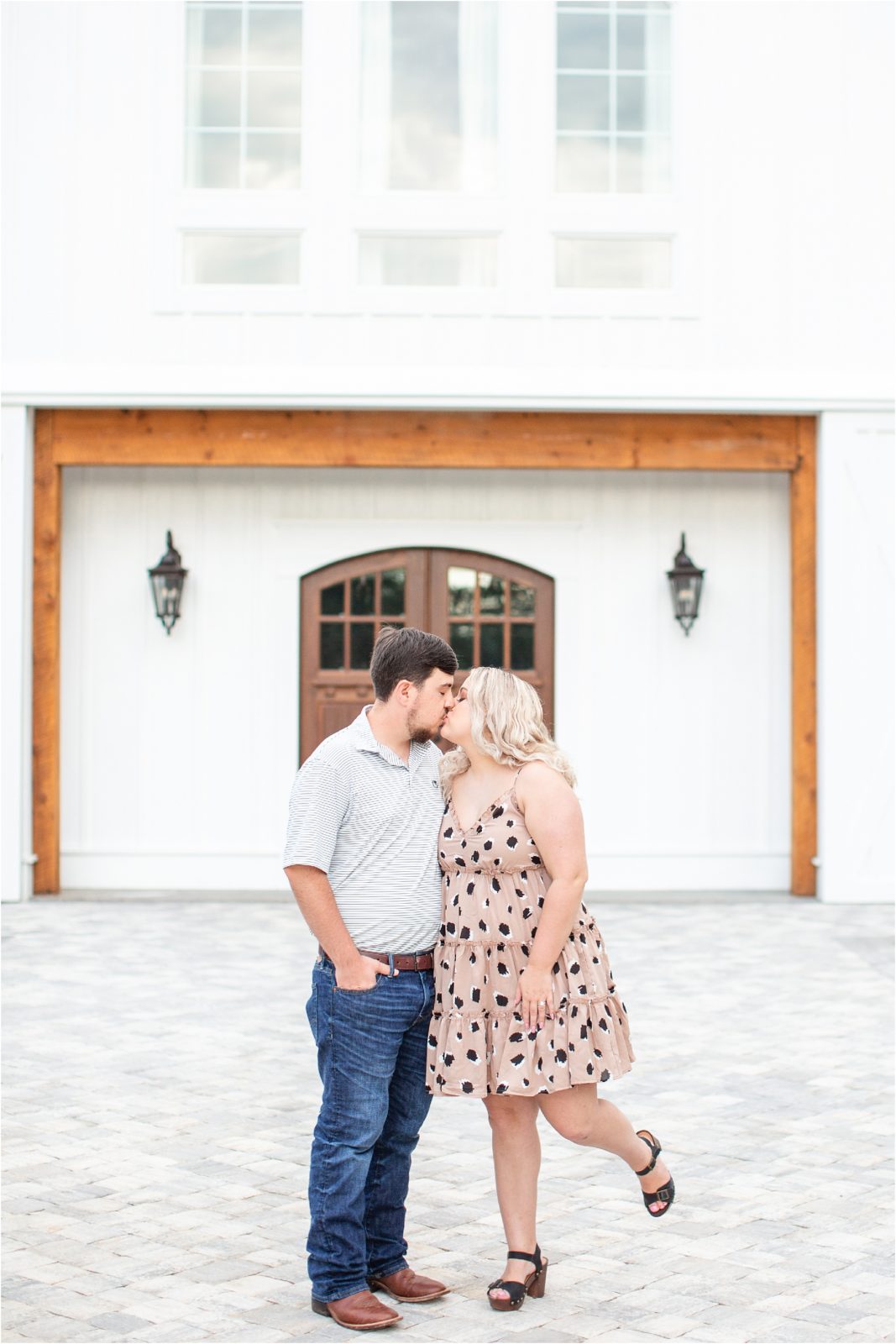 Kissing couple in front of Heyward Manor
