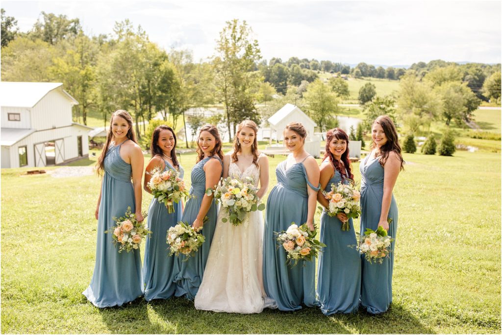 bridesmaids before wedding at outdoor ceremony