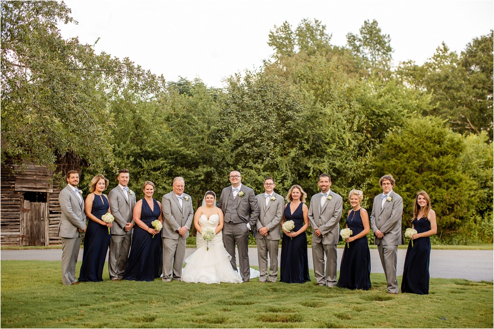 Full bridal party in wedding clothes