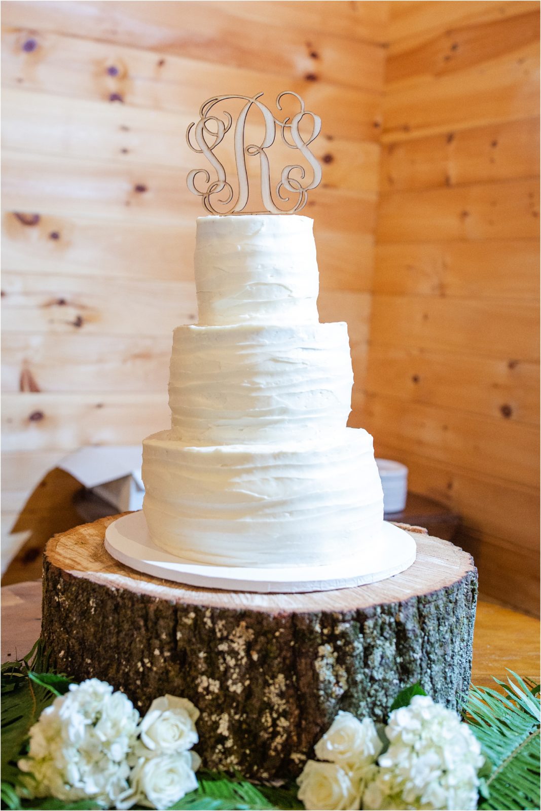 Wedding cake on wood slab