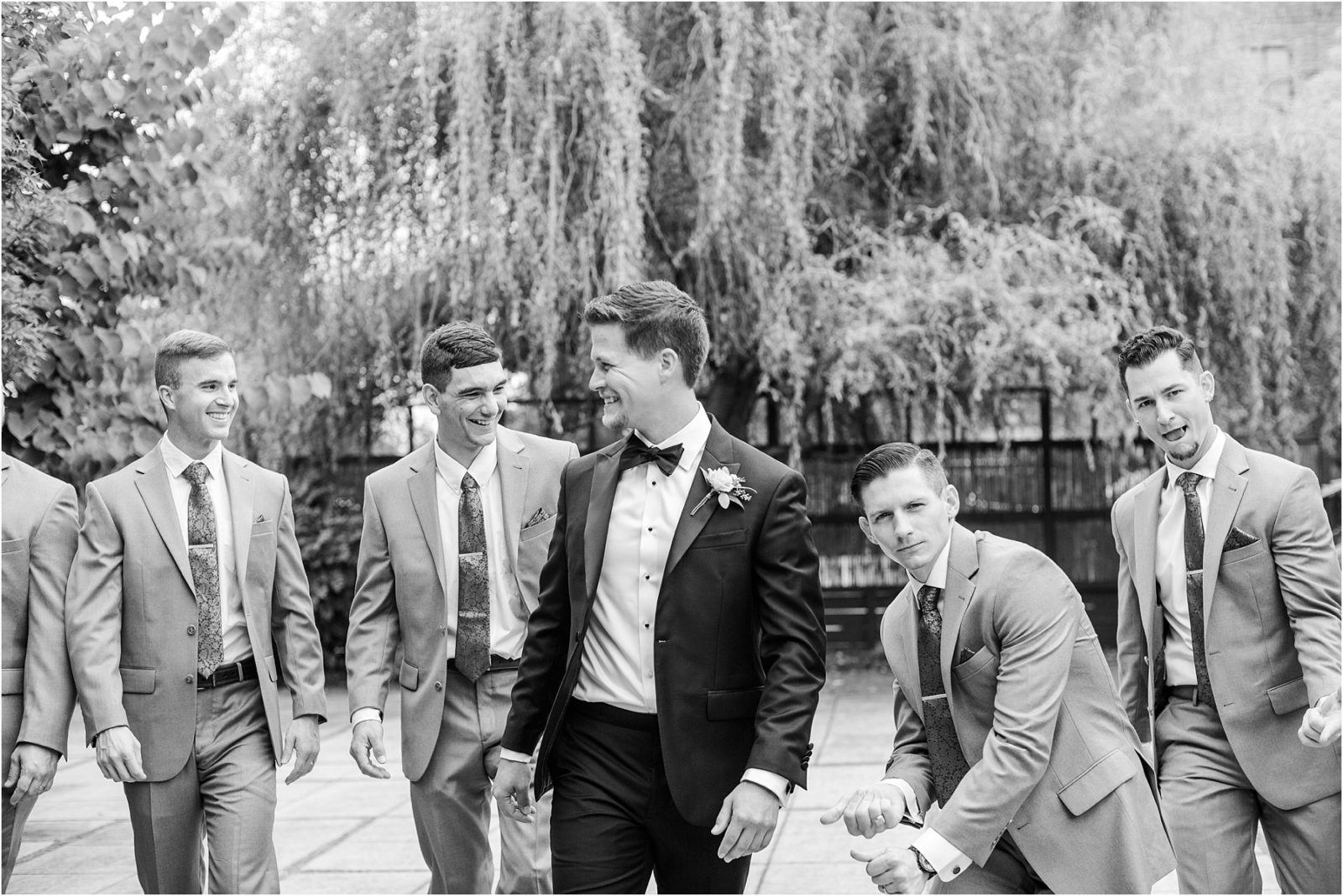 Groom with friends laughing
