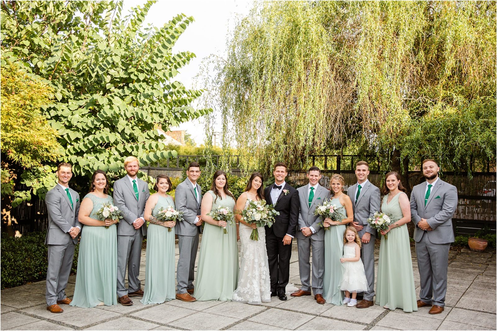 Groom and bride with full bridal party