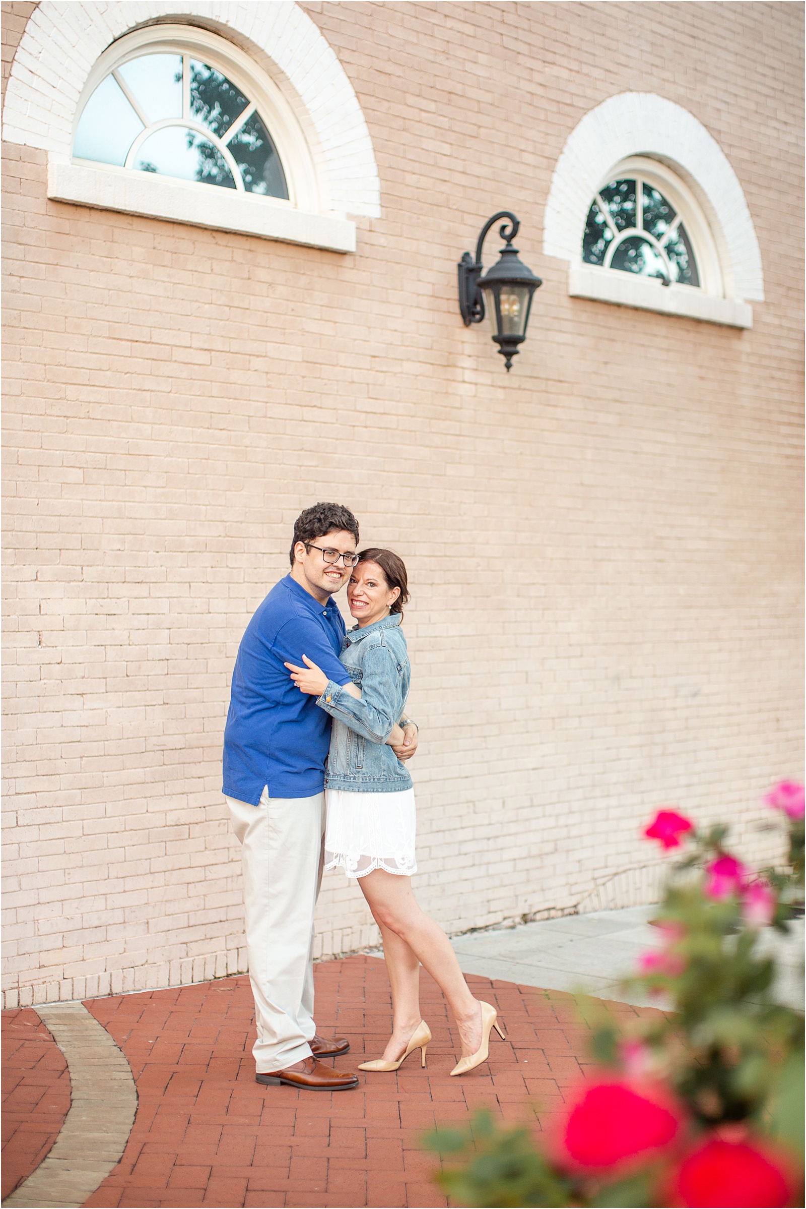 Historic downtown Anderson building with engaged couple