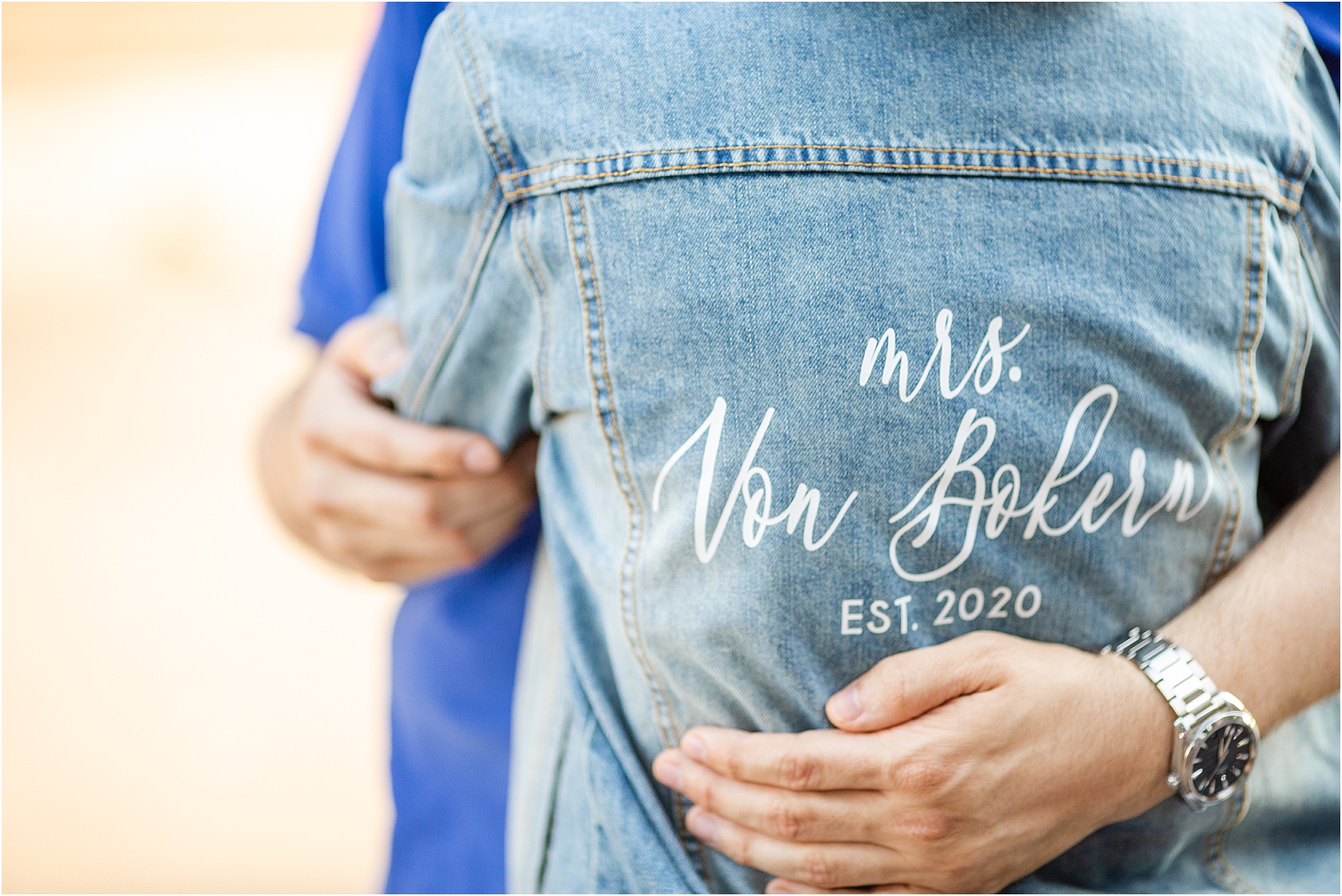 Jean jacket with woman's married last name on it