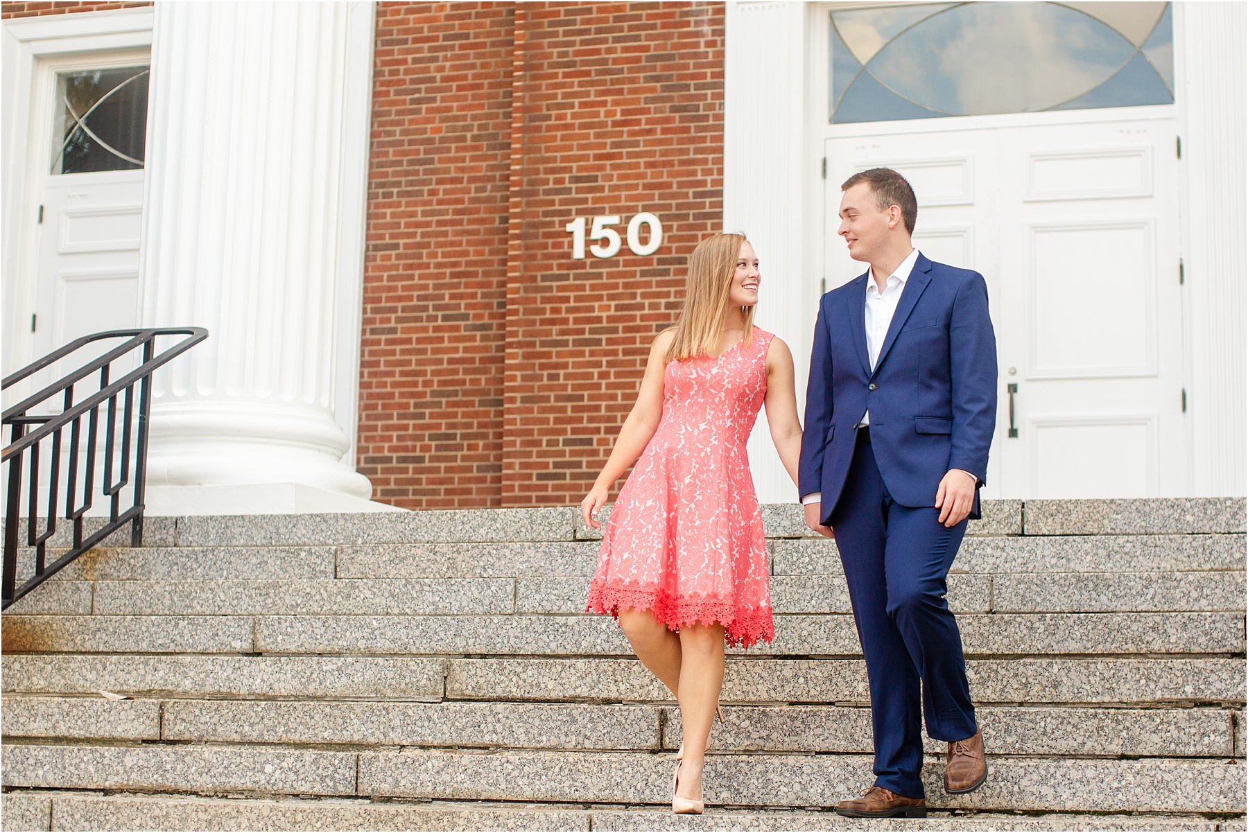 Engaged couple taking pictures on Kentucky church steps