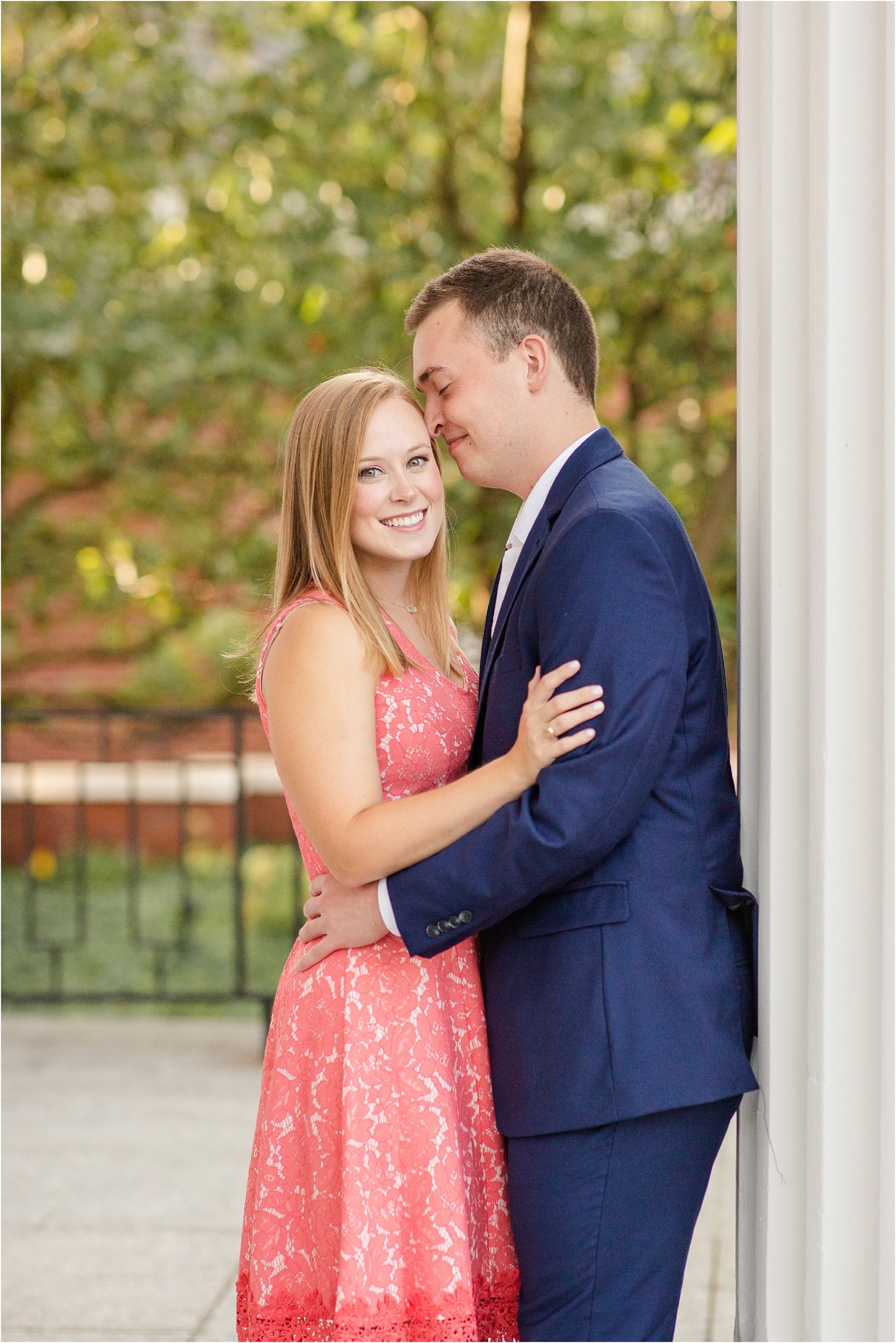 Couple taking engagement pictures in front of Kentucky church