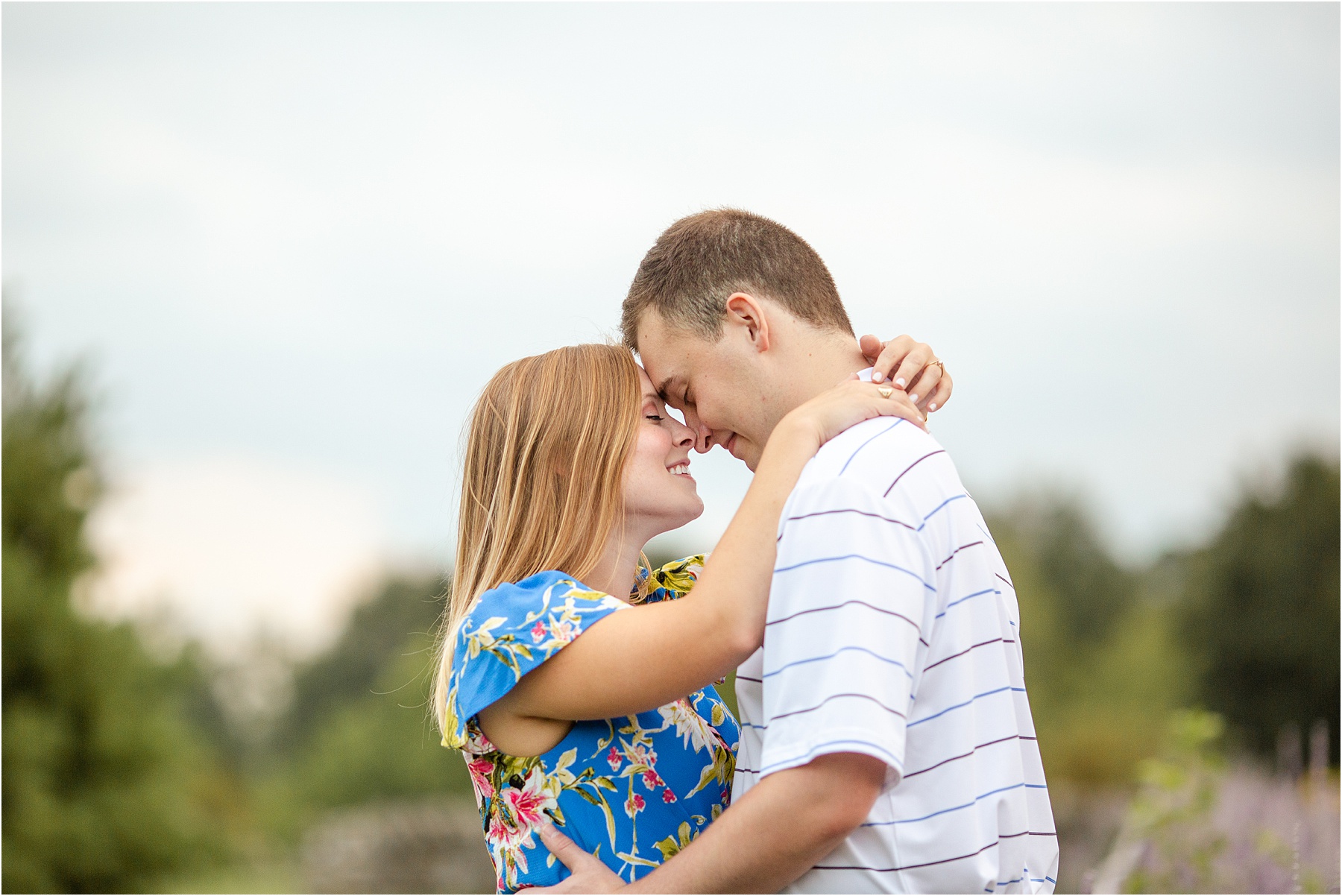 Engagement session for man and woman in Kentucky gardens