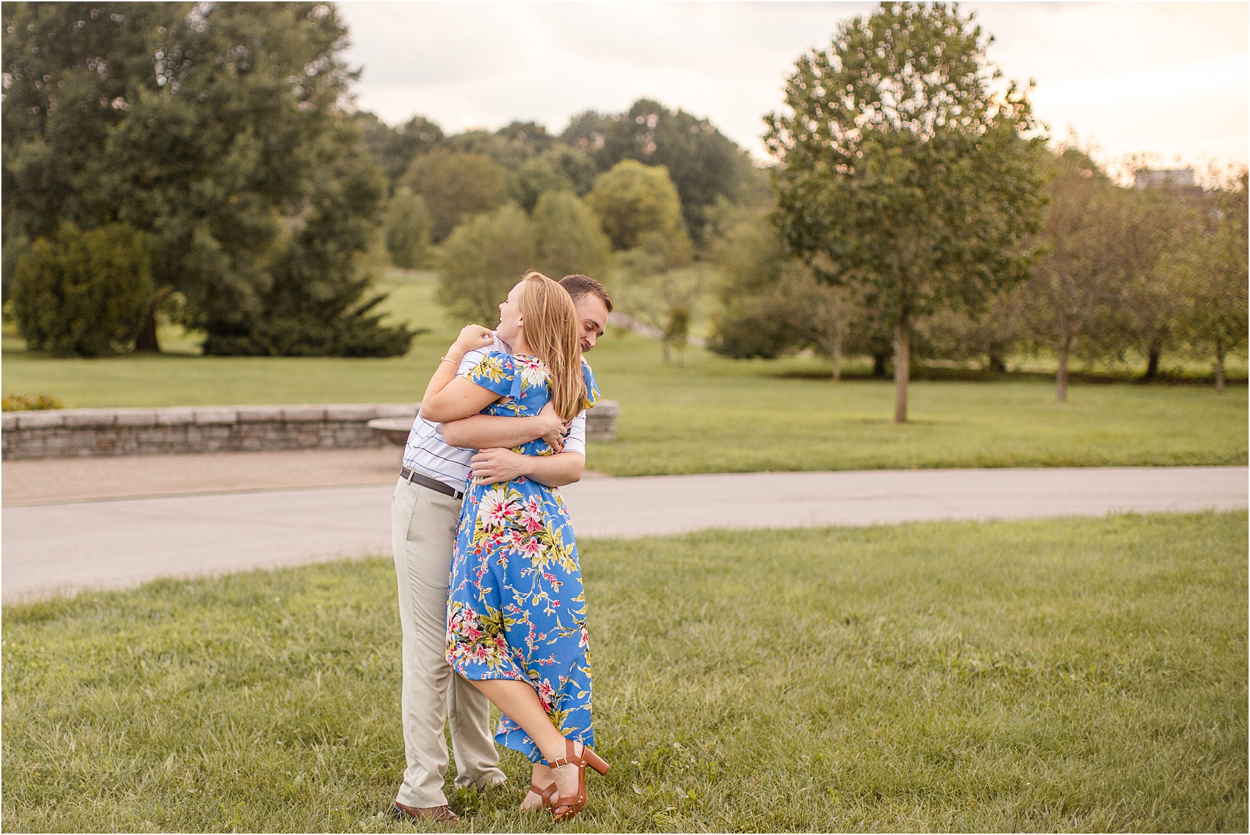 Man and woman hug in Kentucky botanical gardens