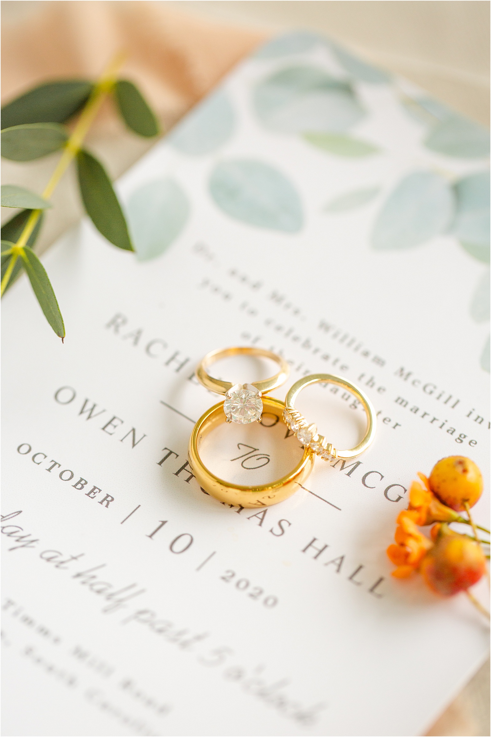 Three rings on top of a wedding invitation in Anderson South Carolina