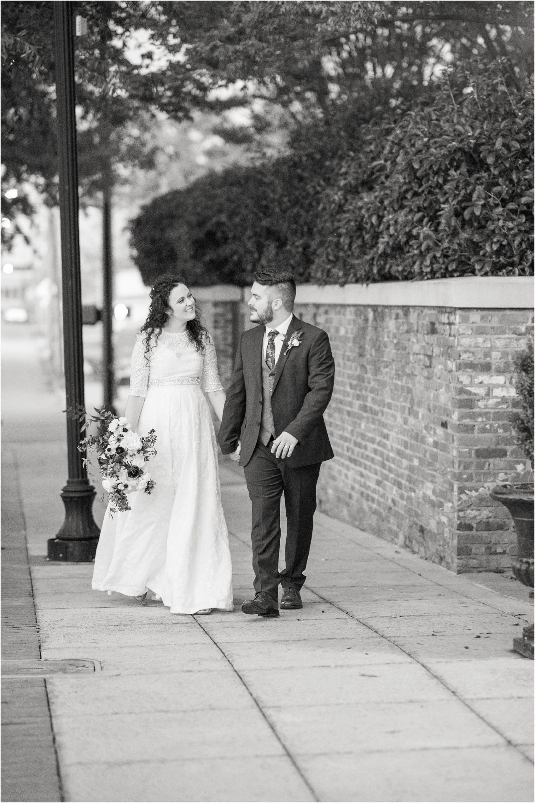 Just married couple walking on sidewalk after Bleckley Inn Wedding