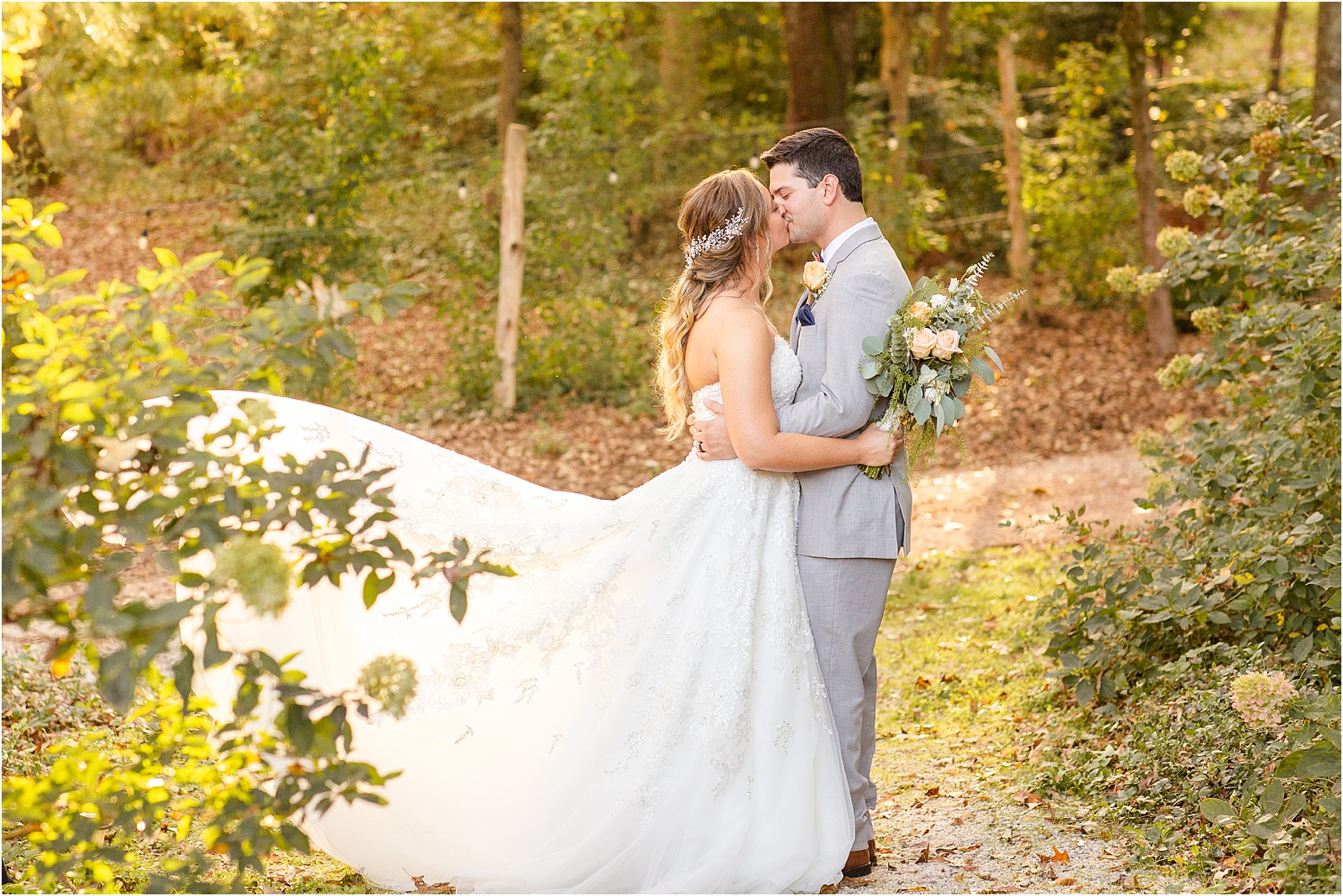husband and wife just married share a kiss in Clemson SC