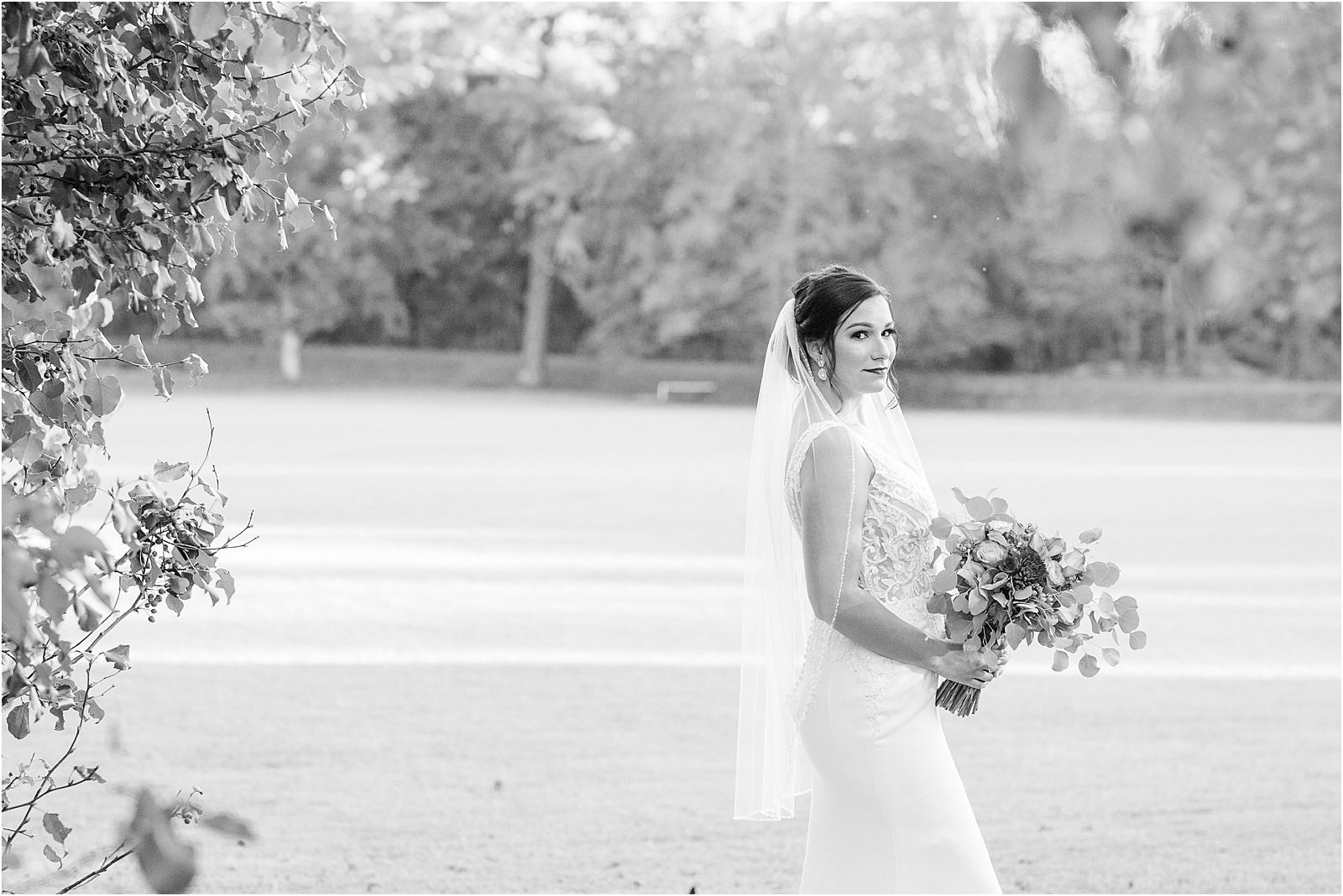 Bride holding flowers in a field in Richland SC