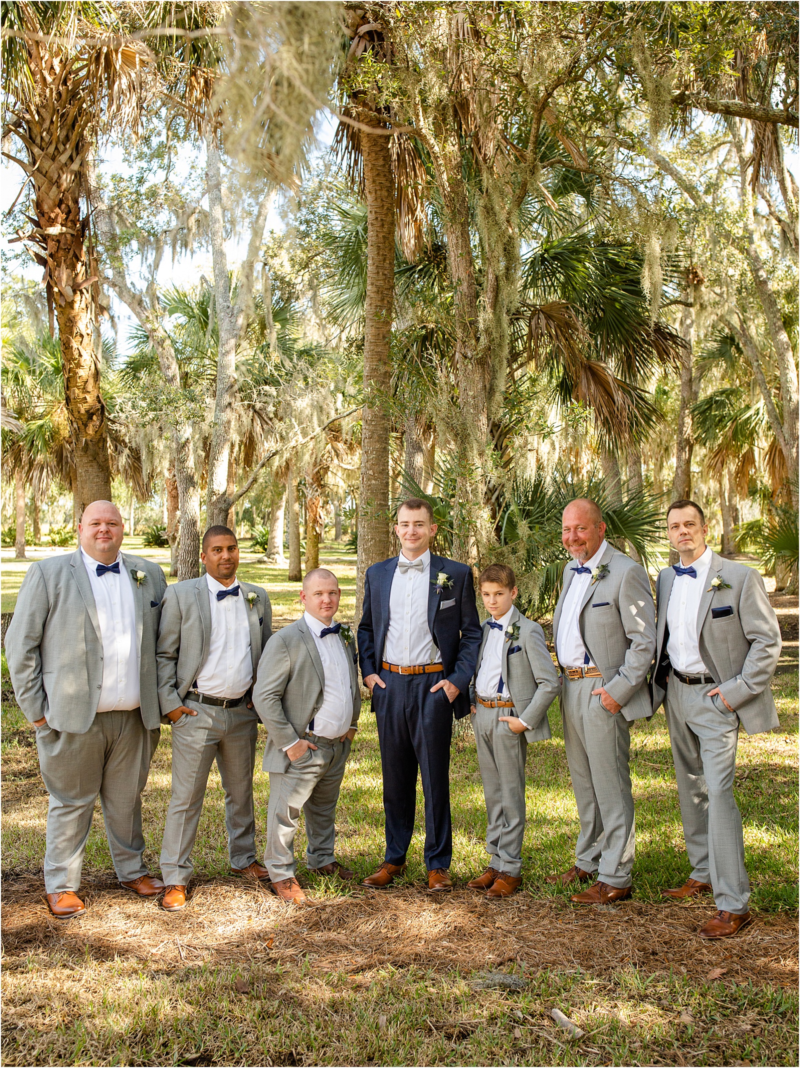 Groom and friends pose before wedding
