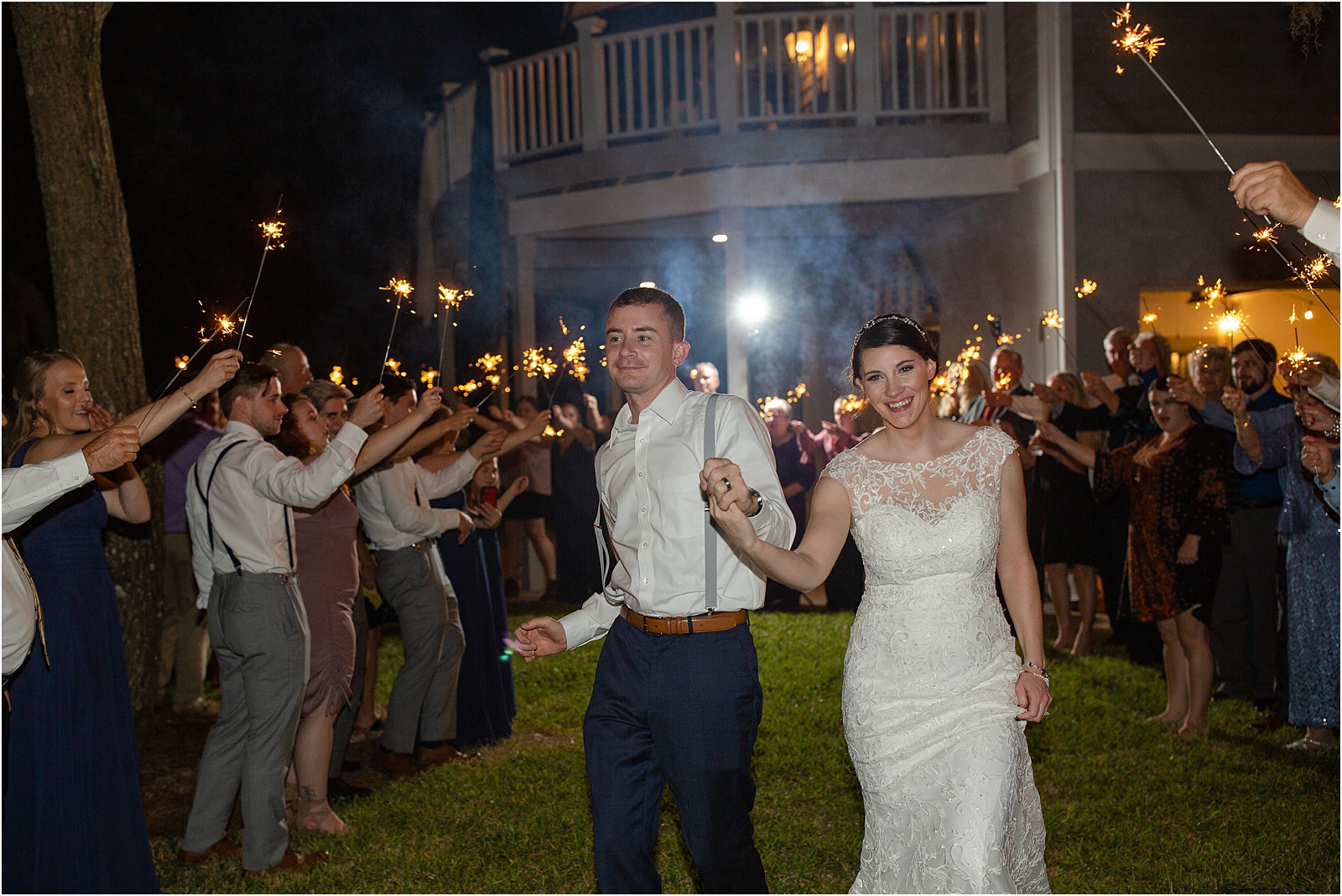 newlyweds leaving wedding on Edisto Island dancing through friends