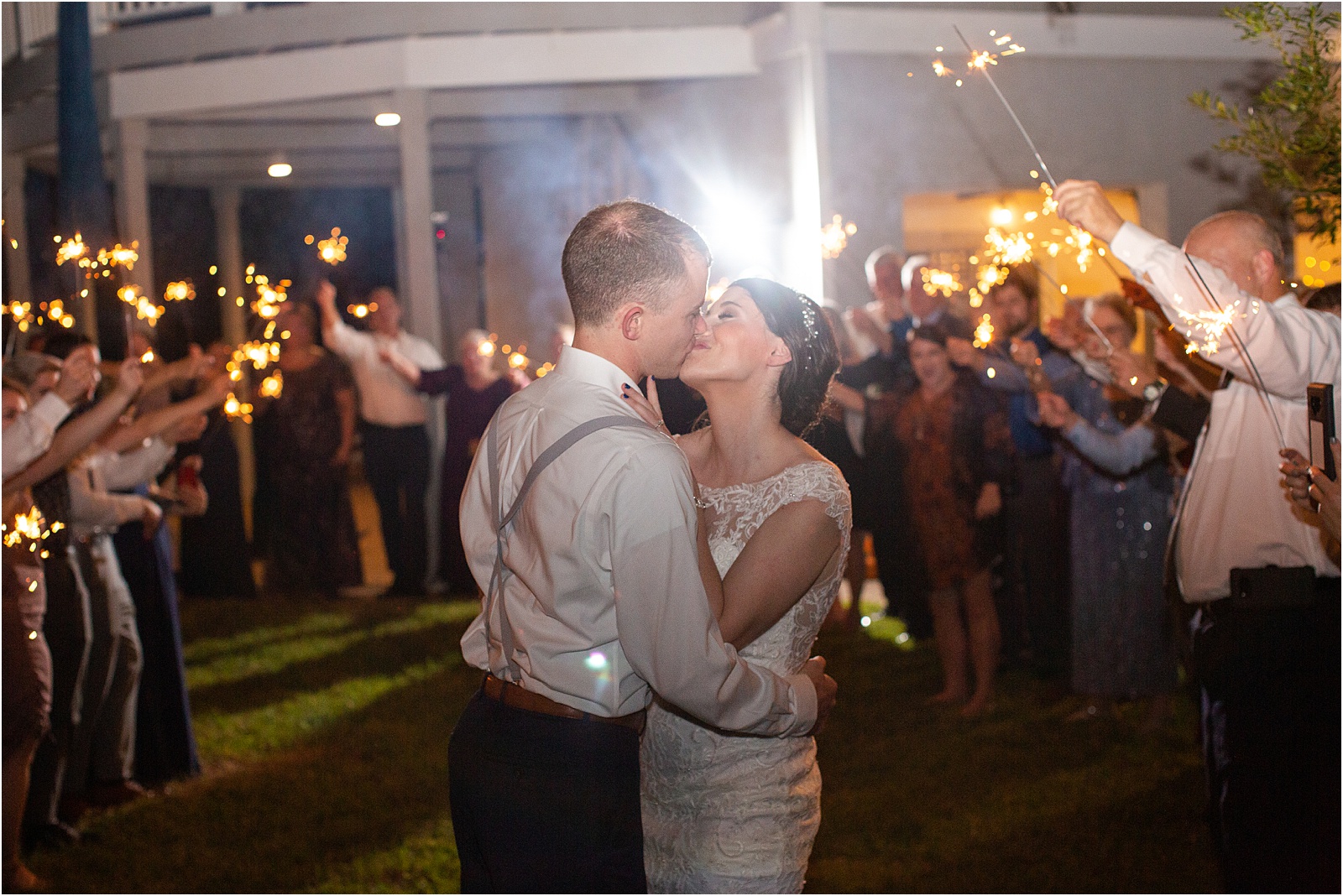 Just married couple leaving their Edisto Island wedding with sparklers