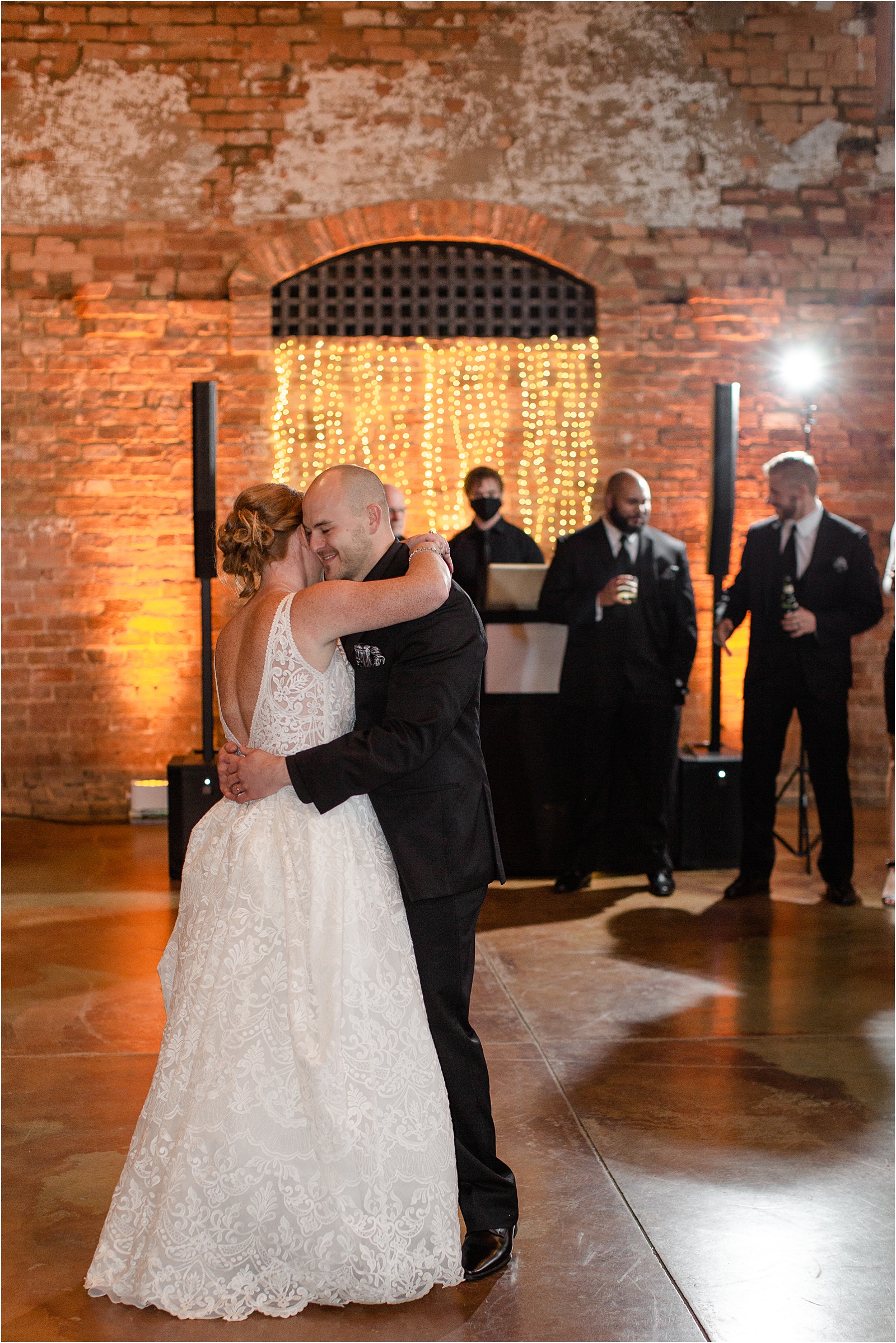 Just married couple sharing first dance at Old Cigar Warehouse