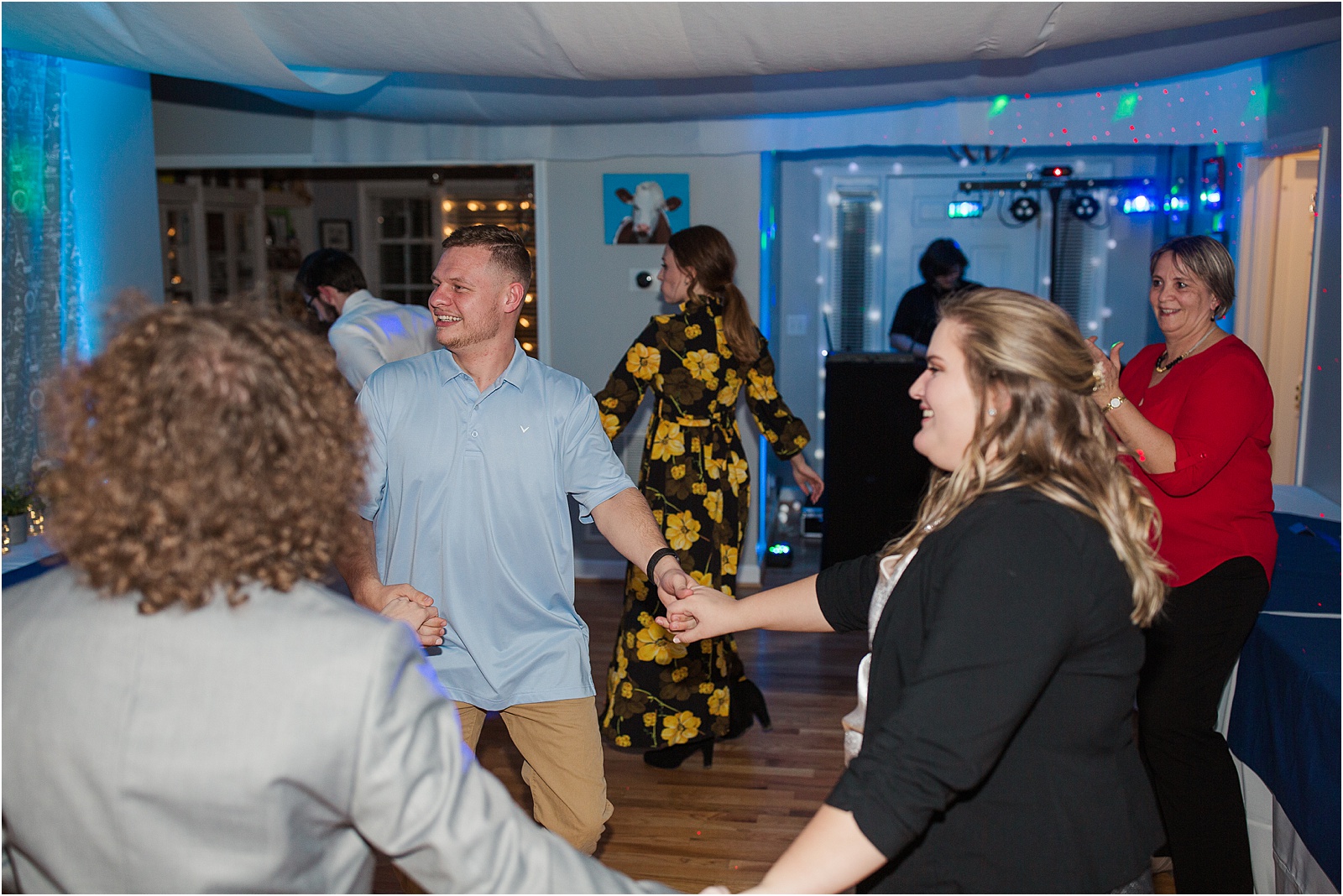 friends dancing at wedding reception