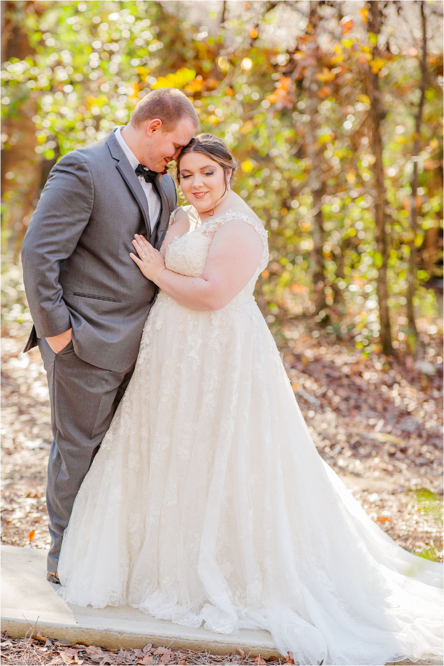 husband and wife on pathway in the woods after ceremony