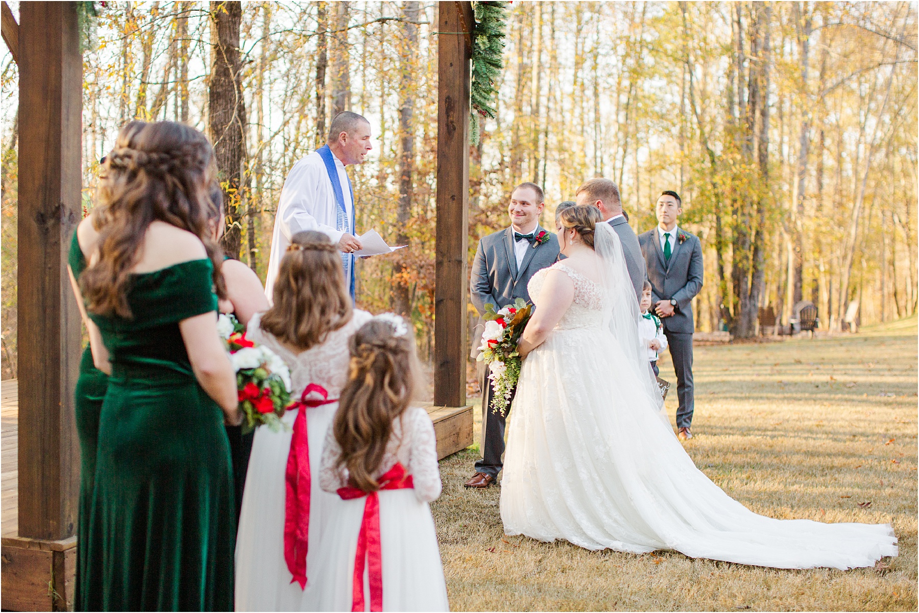 father giving away bride to husband at ceremony