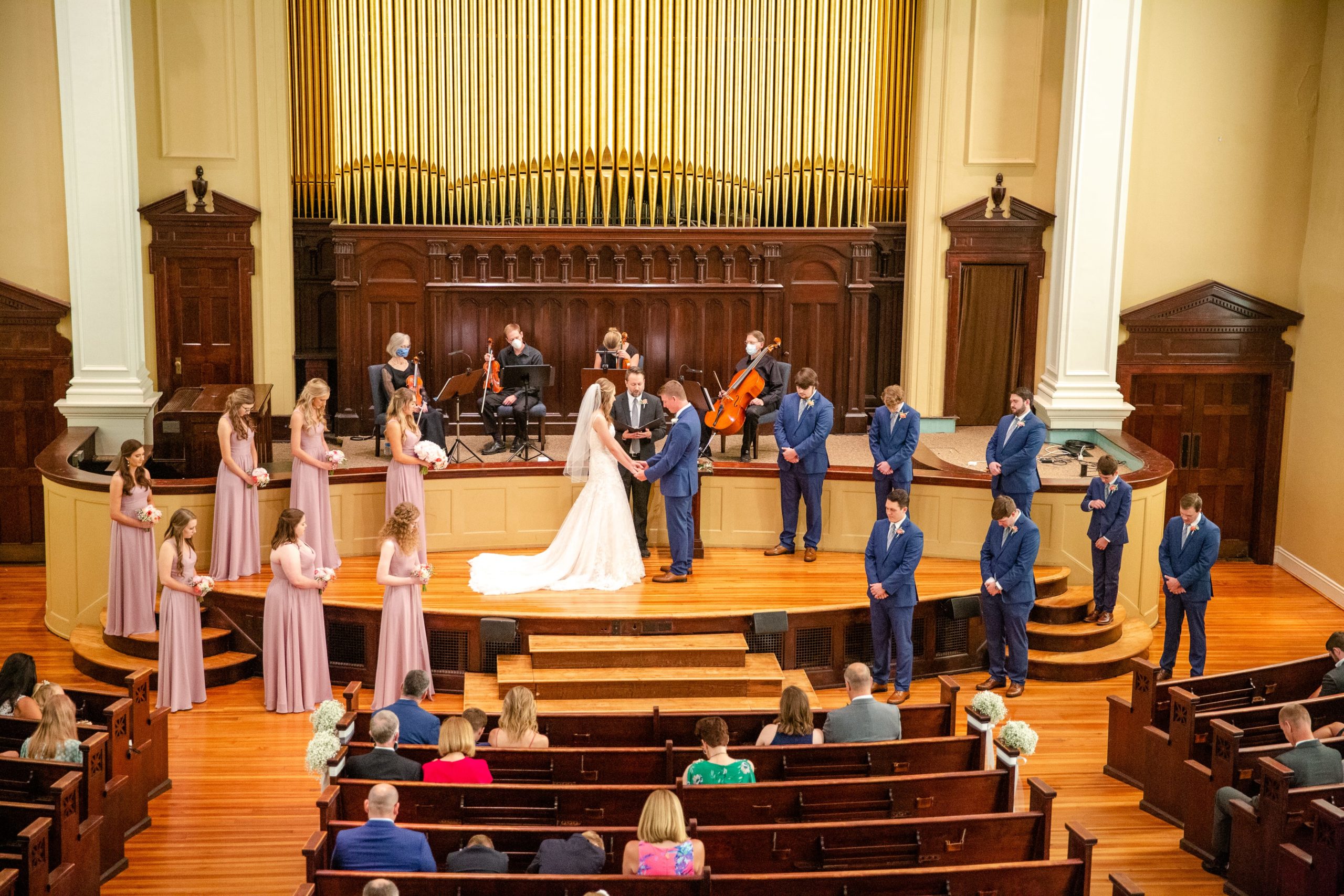 downtown greenville sc church wedding during covid guests spaced out 
