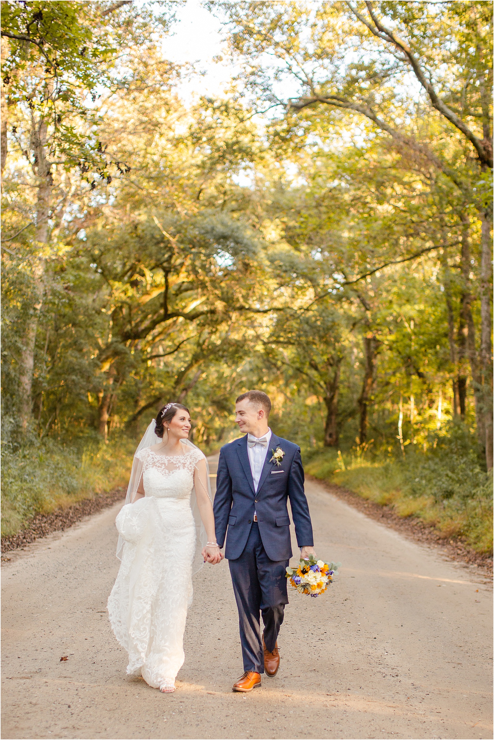 Happy married couple walking for photographer in edisto island 